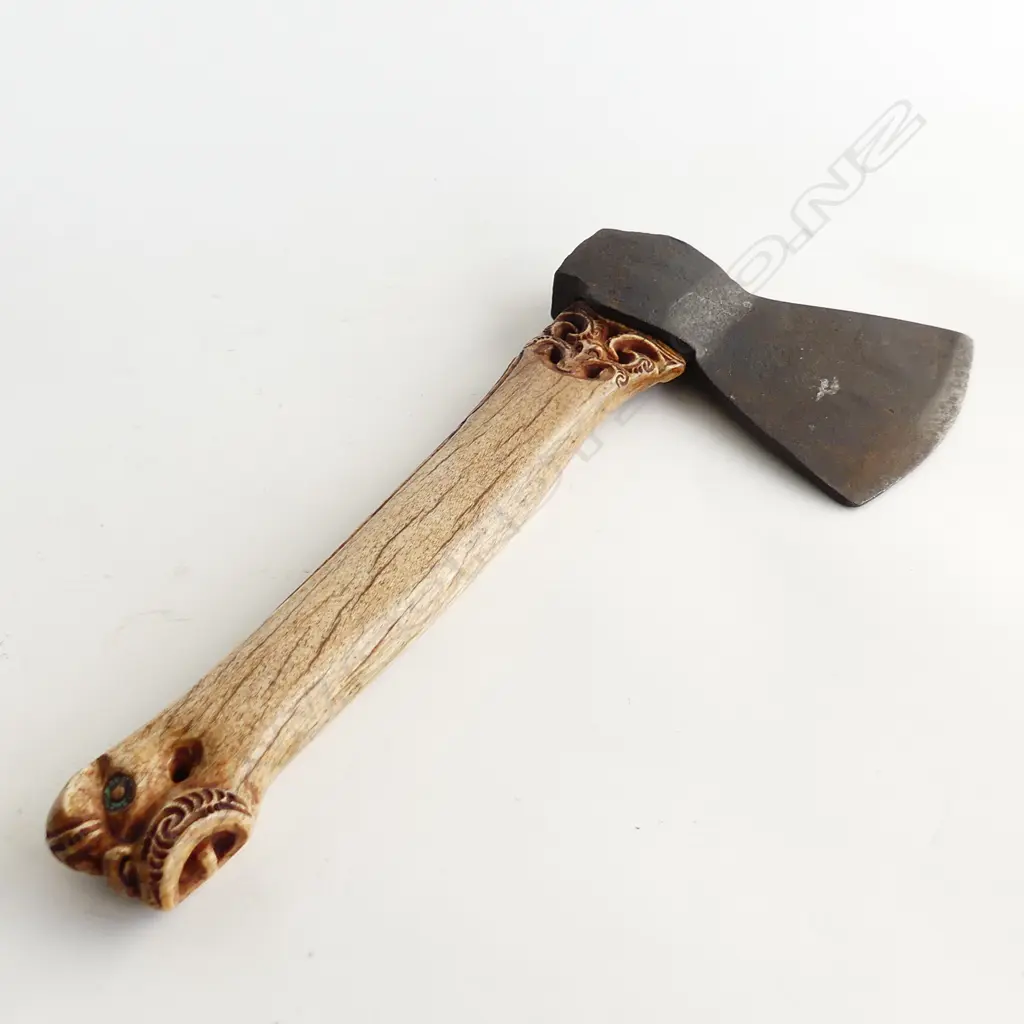 A Māori carved whalebone patiti (hatchet) by Charlie Raponi Wilson, Image 1++